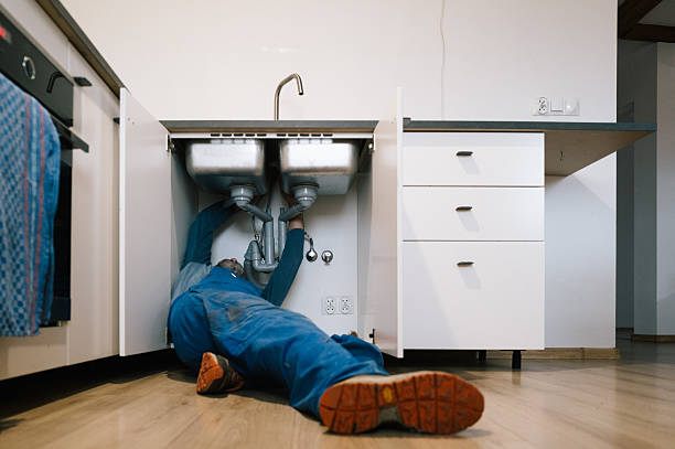 Professional Emergency Plumber technician working in Spraggs, PA